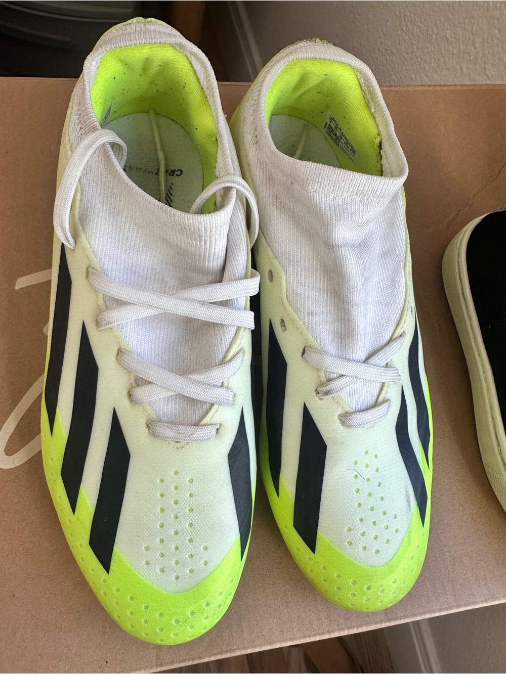 adidas kids White & Neon Yellow Athletic Soccer Shoes